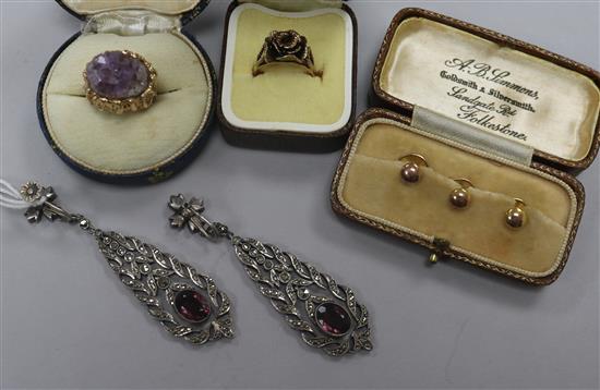 A cased set of three gold dress studs, two 9ct gold rings including amethyst quartz and a pair of 1920s marcasite earrings.